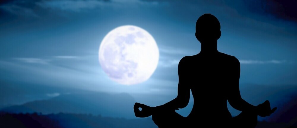 meditation pose in moonlight
