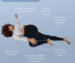 A woman displaying the Reclined Twist yoga pose.  Around her are instructions on the best way to gently do this pose.